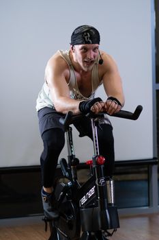 RUSSIA, MOSCOW - APR 09, 2022: bearded bike bicycle legs lifestyle healthy young workout, In the afternoon active health from shape for bodybuilder leg, biking adult. Pedal cycling,