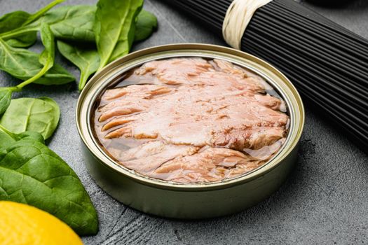 Canned Albacore Wild Tuna set, on gray stone table background