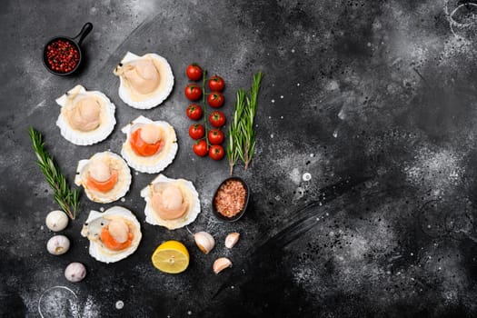 Raw Scallops set, on black dark stone table background, top view flat lay, with copy space for text