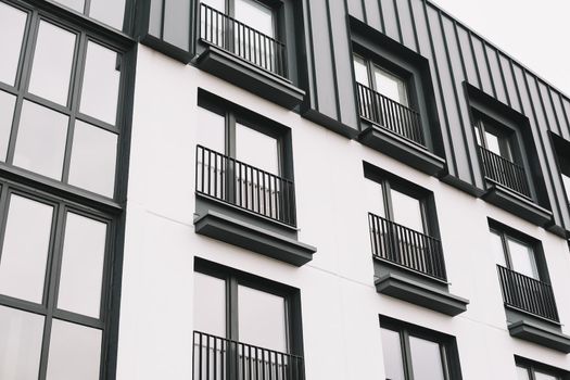 Exterior of typical modern apartment buildings. Abstract geometric background of modern architecture