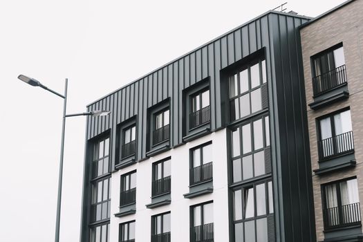 Exterior of typical modern apartment buildings. Abstract geometric background of modern architecture