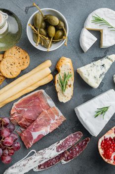 Ingredients for Italian food, meat cheede, herbs set, on gray background, top view