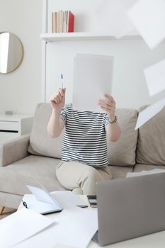 office manager or freelancer in a stylish room. Confident business woman working at workplace in a modern office. Office manager or freelancer work