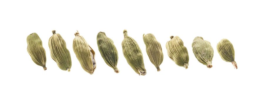 A set of cardamom pods. Isolated on a white background.