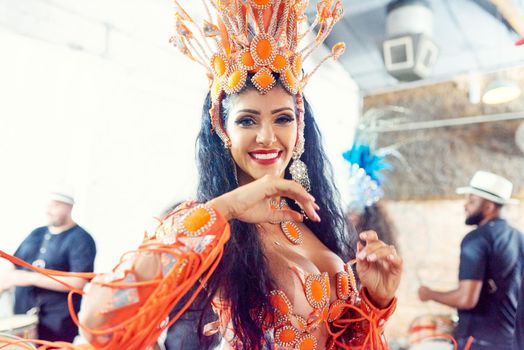 Shot of a beautiful samba dancer performing at a carnival.