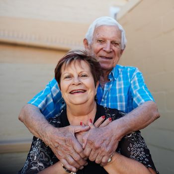 Shot of a senior married couple outside.