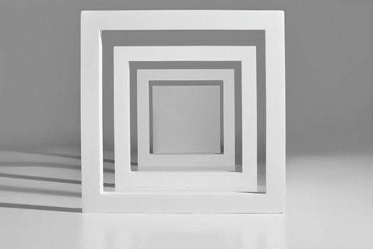 White square podium frames of different sizes on gray background. Concept of stage for product promotion, sale, presentation. Minimalist showcase layout