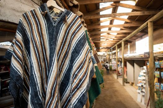 Detailed closeup view of traditional Chilean coat for sale in the market