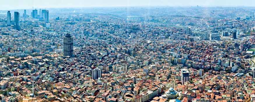 Panorama of the roofs of Istanbul. Retro style. Shooting through glass