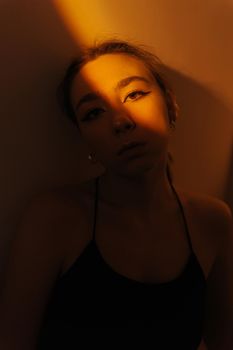 portrait of a young woman with spot light closeup