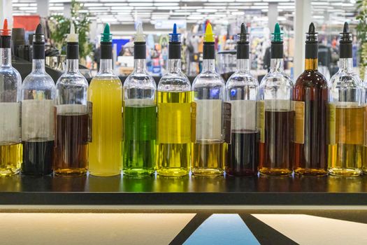 bottles of alcoholic beverages for making cocktails at the bar. photo