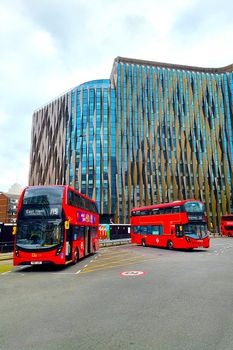 London, United Kingdom, February 6, 2022: bus stop for the famous double-decker red buses in London