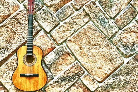 a brief record of facts, topics, or thoughts, written down as an aid to memory. a stringed musical instrument, with a fretted fingerboard, typically incurved sides, and six or twelve strings
