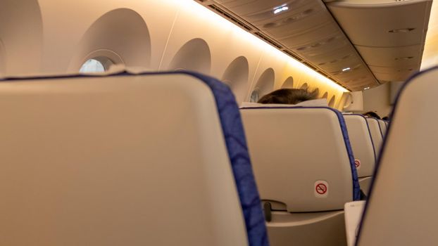 Seating interior of an airplane cabin