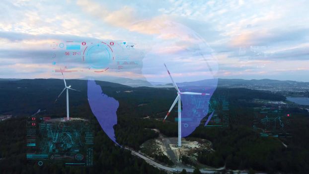 Aerial view over the farm landscape and wind turbines generating clean renewable energy. Renewable energy production for the green ecological world. High quality photo