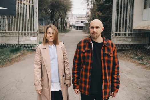 Loving caucasian blond couple walking at street