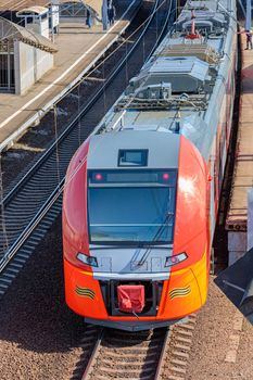 A modern high-speed train stands at the station.