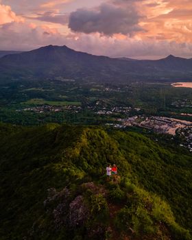 Mauritius, view from the mountain at sunset, Black River Gorges National Park Mauritius during sunset,couple man and woman watching sunset