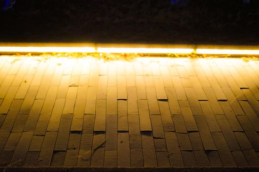 Orange illuminated brick sidewalk. Shooting Location: Yokohama-city kanagawa prefecture