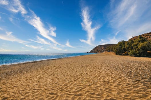 Golden sand in the beach of Roukounas in Anafi island of Greece