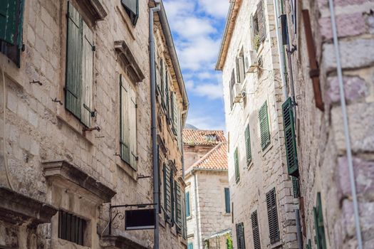 Colorful street in Old town of Kotor on a sunny day, Montenegro.