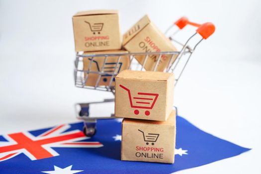 Online shopping, Shopping cart box on Australia flag, import export, finance commerce.