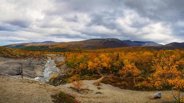 North Russia Khibiny mountains in autumn mountain lake and forest. Murmansk region. photo