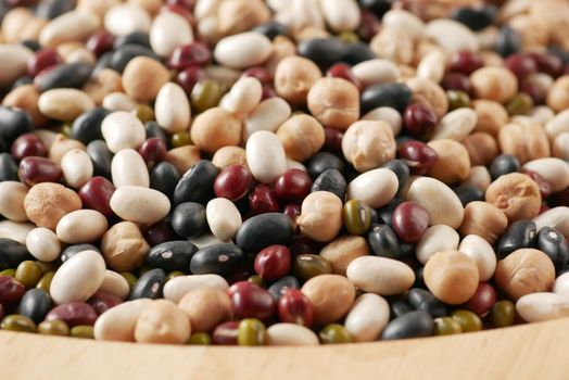 close up of mixed beans in a bowl .
