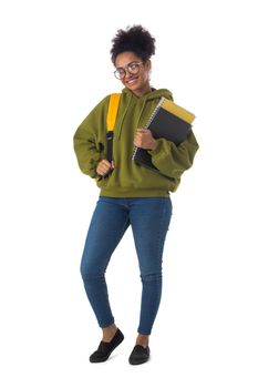 Friendly ethnic black female high school student in eyeglasses with backpack and composition book isolated on white background, full length portrait