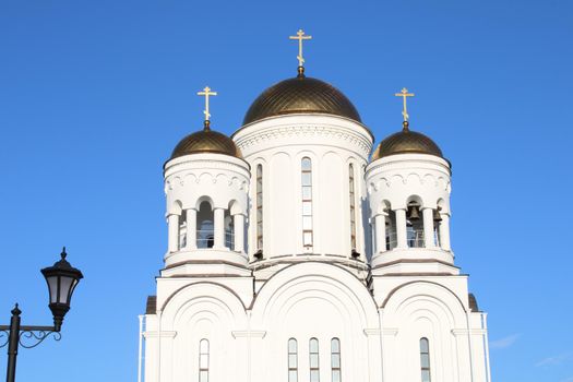 The church is made of white stone. Religion. Orthodoxy. Architecture. High quality photo