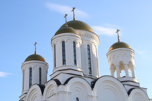 The church is made of white stone. Religion. Orthodoxy. Architecture. High quality photo