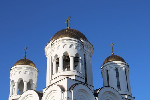 The church is made of white stone. Religion. Orthodoxy. Architecture. High quality photo