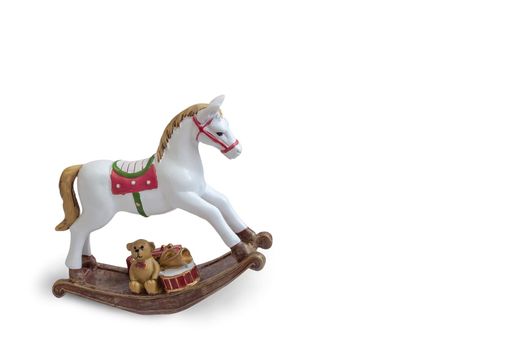 Preschool toy : a white rocking horse made of ceramic . Isolated on a white background. An element of the interior of the children's and playroom. A traditional children's game.