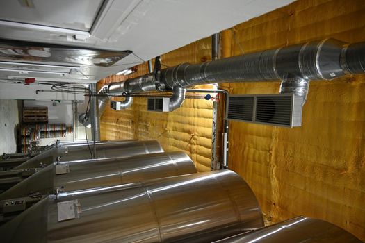 Photo of large stainless steel tanks for beer production