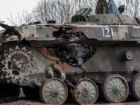 War in Ukraine. Armored vehicles of the Russian army on the streets of Ukraine. Military tanks and self-propelled artillery mounts. Russian military equipment knocked out by the Ukrainian army.