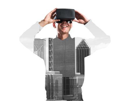 Young man with virtual reality headset or 3d glasses over cityscape background