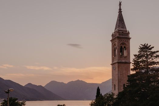 Beautiful view of the coast of Kotor Bay and St.Eustace's Church in the village Dobrota in Montenegro. Church of St. Eustachius is located in Dobrota , Kotor Montenegro