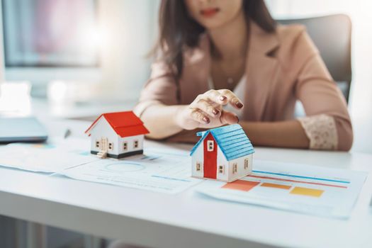 Planning, spending, focusing on the home model with the client making decisions about buying a home with a real estate agent to manage financial and investment risks