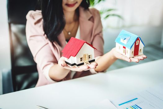 Planning, spending, focusing on the home model with the client making decisions about buying a home with a real estate agent to manage financial and investment risks