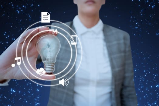 Lady in suit holding light bulb representing innovative thinking.