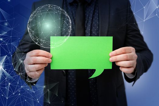 Businessman in suit holding paper represents global innovative thinking.