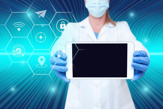 Nurse holding tablet symbolizing successful teamwork accomplishments.