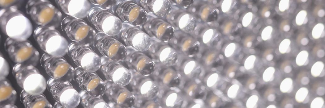 Closeup of lots of bright leds in lamp background. Energy saving lamps concept