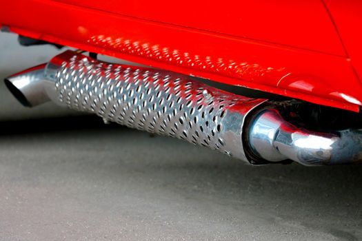 Large exhaust pipe of a powerful car, pickup truck