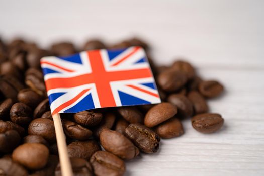 United KIngdom flag on coffee beans; import export drink food concept.