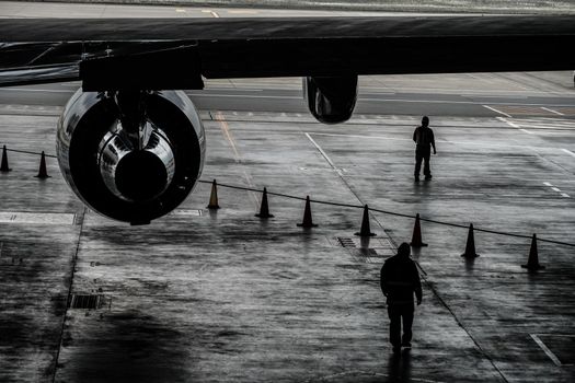 Airplane engine and worker. Shooting Location: Tokyo metropolitan area