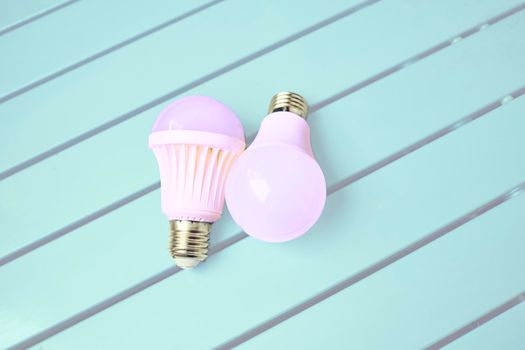 a device for giving light, either one consisting of an electric bulb together with its holder and shade or cover