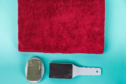 Top view of manicure and pedicure equipment on blue background. Still life.