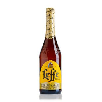 Tallinn, Estonia - March, 2022: Bottle of belgian Leffe blond beer isolated on a white background.