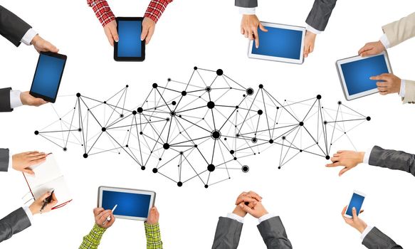 Group of people with devices in hands working together as symbol of networking and communication